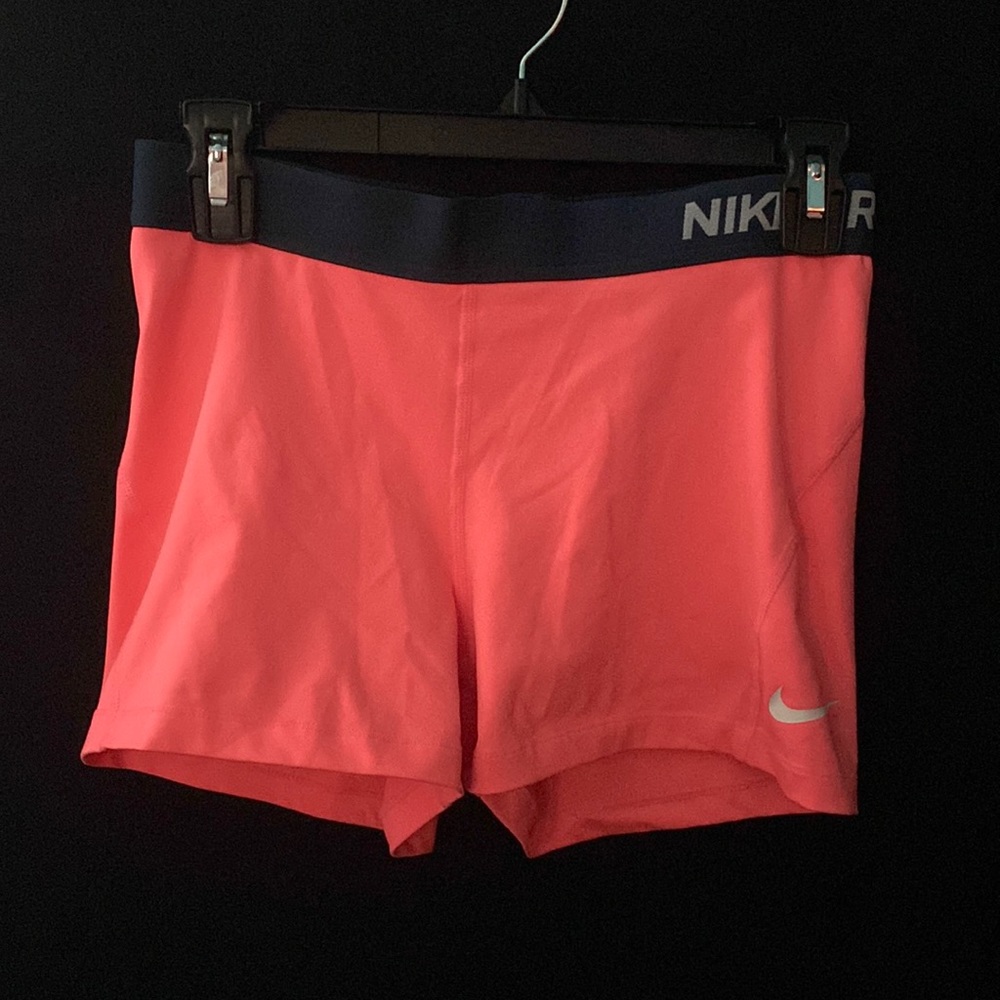Bright Coral/pink Nike pros